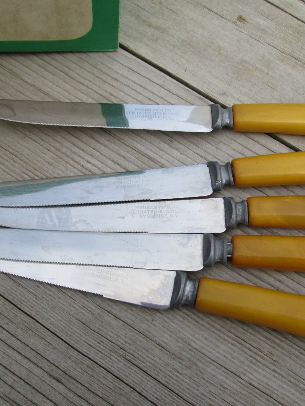 vtg Burns Mfg Co  5 serrated steak knives butterscotch bakelite handles